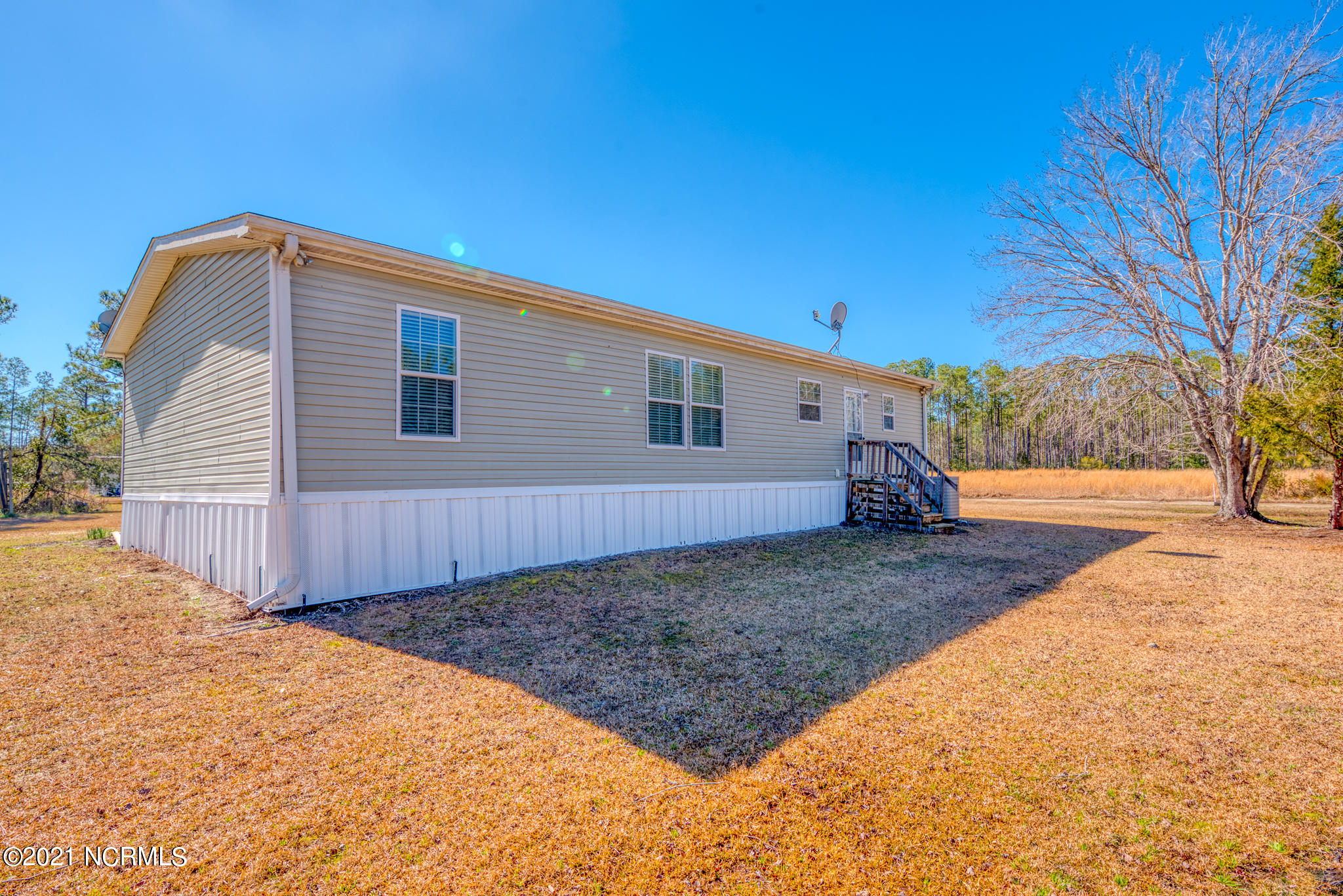 60 Gerainium Road Hampstead, NC 28443 - Photo 29 of 31 Outside Back View 1