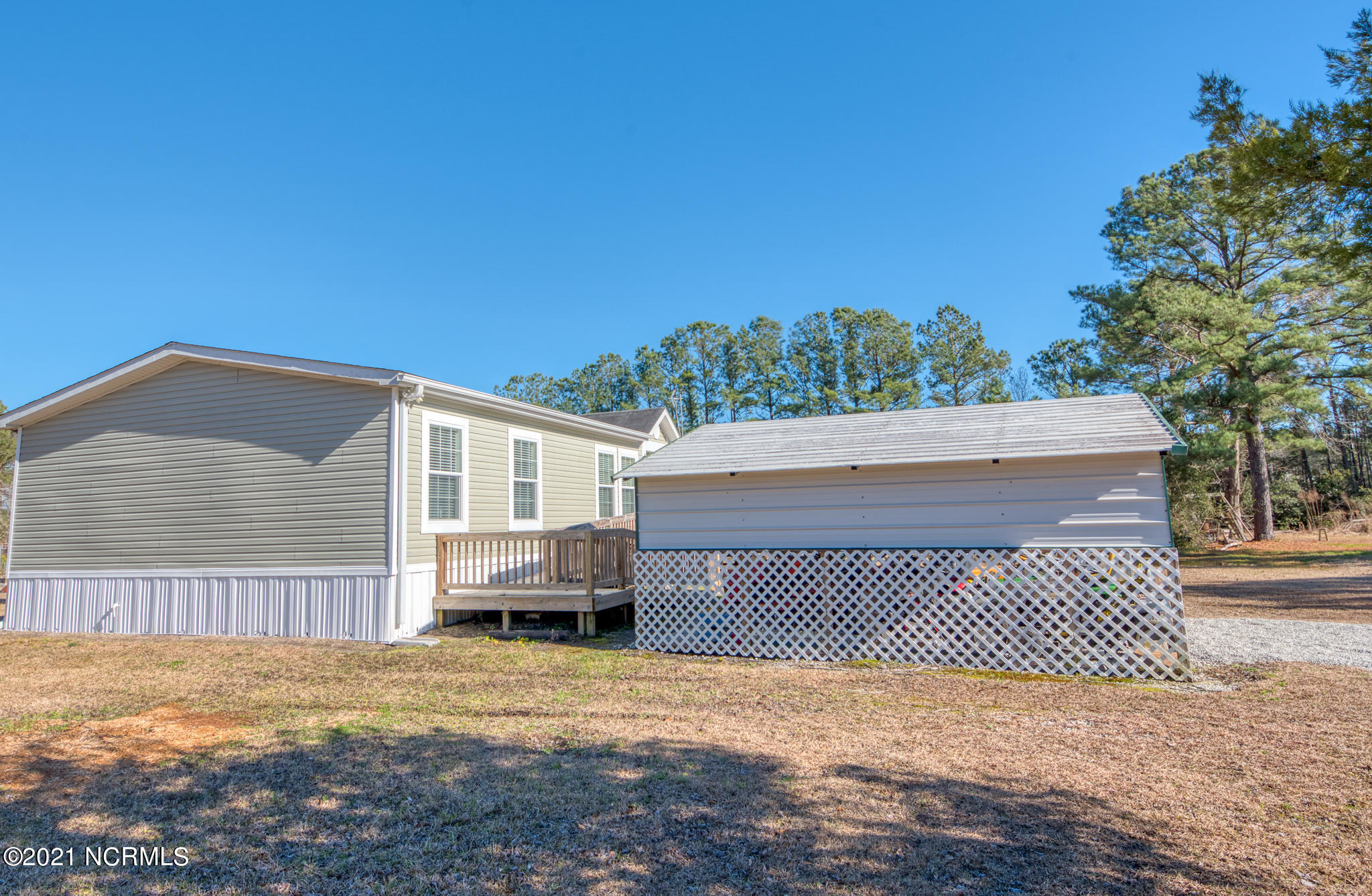 60 Gerainium Road Hampstead, NC 28443 - Photo 5 of 31 Outside Front Side