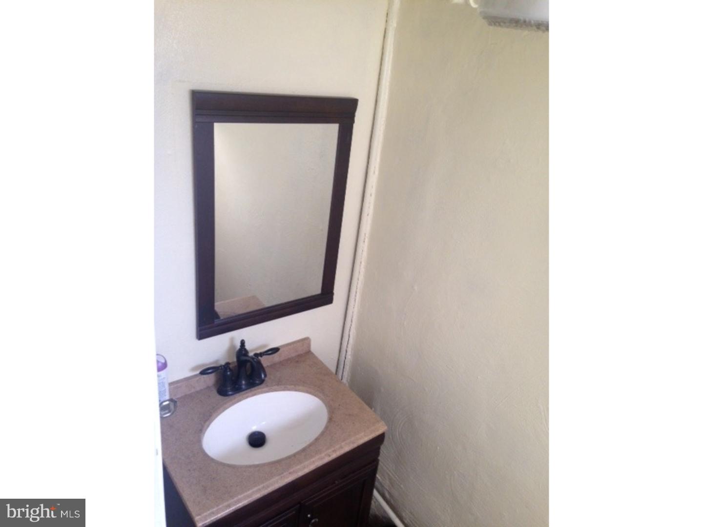 7449 Brockton Road Philadelphia, PA 19151 - Photo 11 of 13 Half Bath
