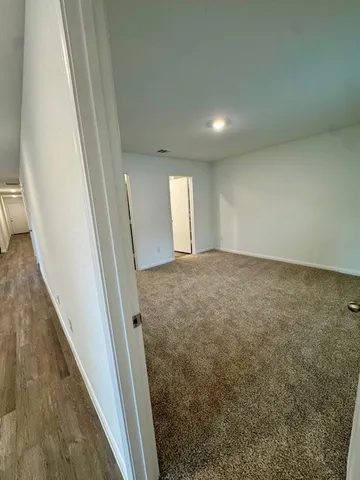 an empty room with an entryway