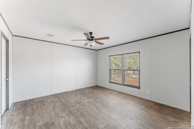 a kitchen with a stove a refrigerator and a sink