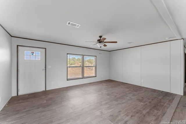 a kitchen with stainless steel appliances a sink stove and refrigerator