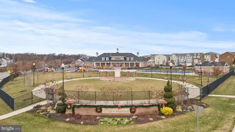 a view of a swimming pool with a lake view