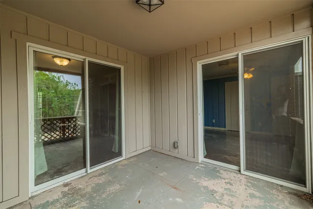 a view of a room with a large window