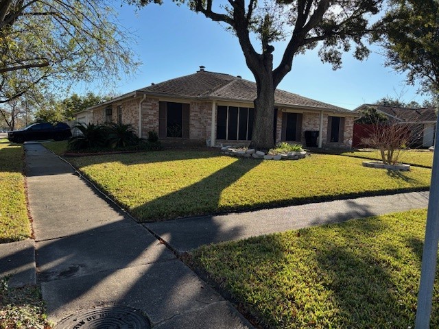 7003 Pyron Way Houston, TX 77036 - Photo 23 of 26 a view of swimming pool with lawn chairs and plants