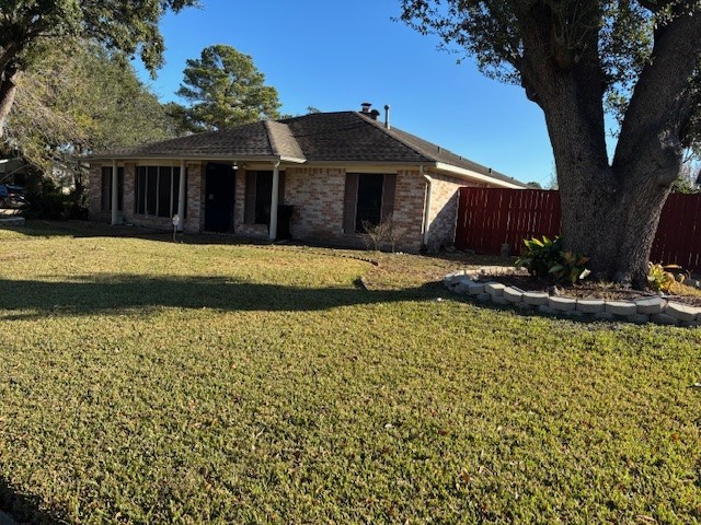 7003 Pyron Way Houston, TX 77036 - Photo 25 of 26 a front view of a house with a yard