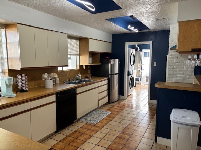 7003 Pyron Way Houston, TX 77036 - Photo 4 of 26 a kitchen with stainless steel appliances granite countertop a sink and cabinets