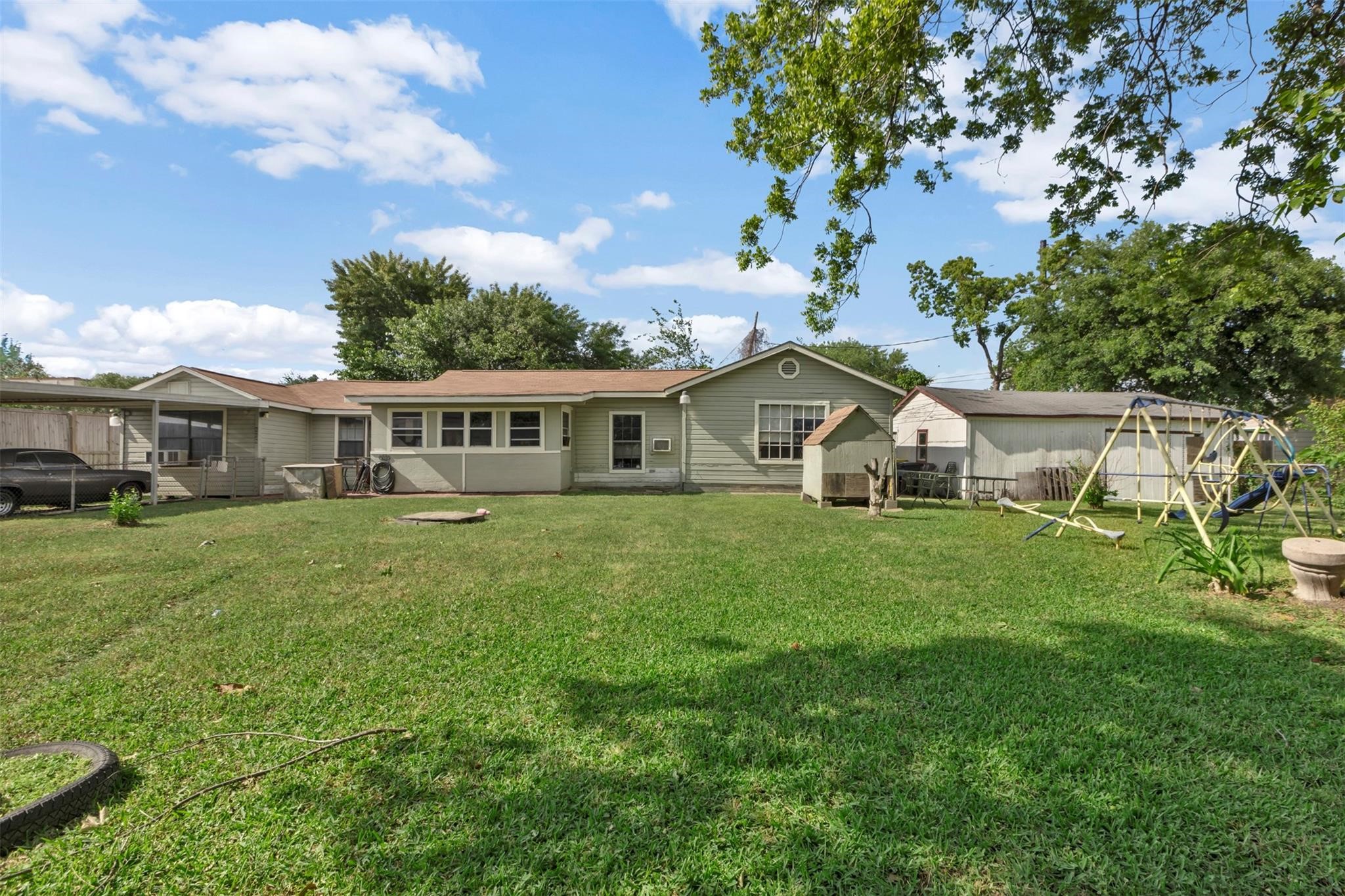 808 Morrell Street Baytown, TX 77520 - Photo 2 of 25 a front view of house with yard and green space