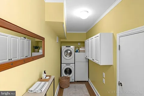 a view of hallway with wooden floor