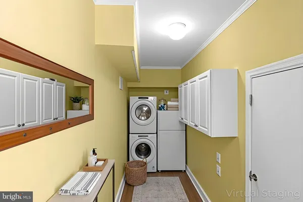 a view of hallway with wooden floor