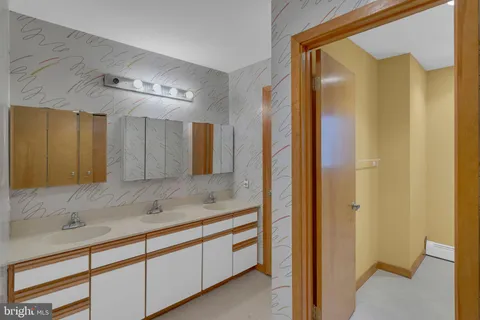 a bathroom with a shower and a toilet