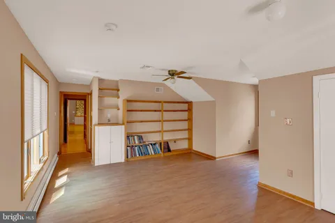 a view of a backyard with sitting area