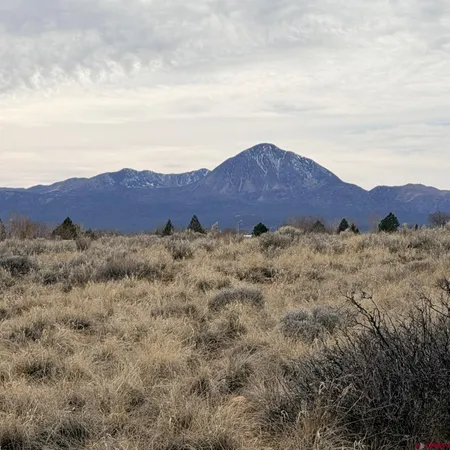 a view of ocean and mountain