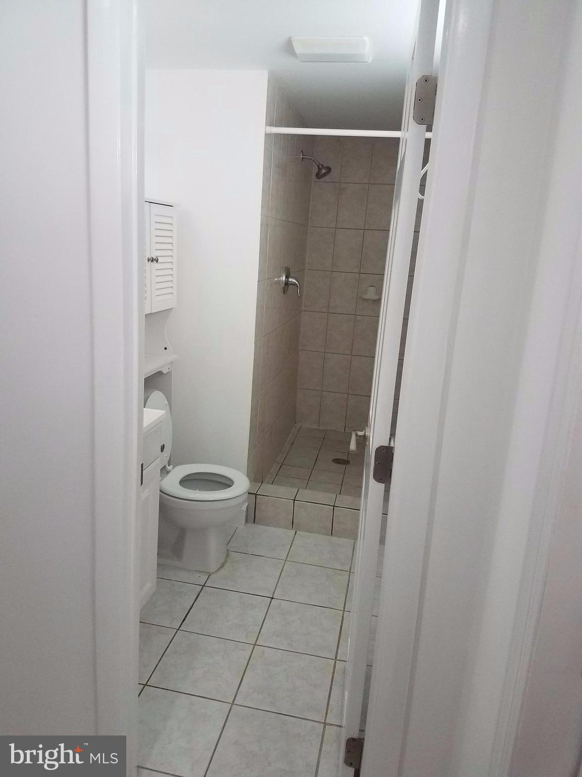200 Summit Hall Road Gaithersburg, MD 20877 - Photo 22 of 29 Basement Bathroom with Ceramic Tile