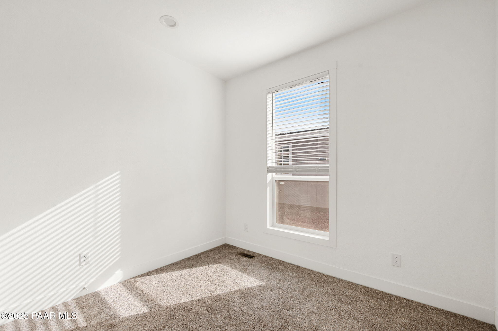 29 East Abra Road Paulden, AZ 86334 - Photo 15 of 22 a view of an empty room with a window