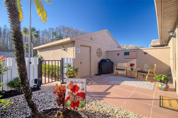 a view of a chairs and tables in the patio
