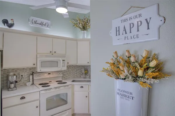 a bathroom with a sink a vanity and mirror