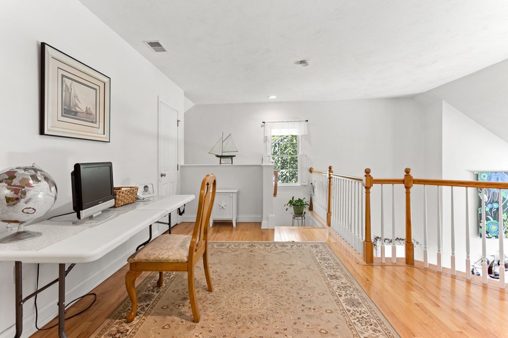 1 Prestwick Road, Unit 1 Bourne, MA 02532 - Photo 18 of 31 a view of a dining room with furniture