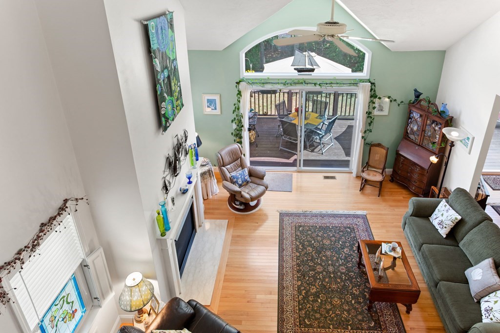 1 Prestwick Road, Unit 1 Bourne, MA 02532 - Photo 21 of 31 view of living room with furniture and a large window