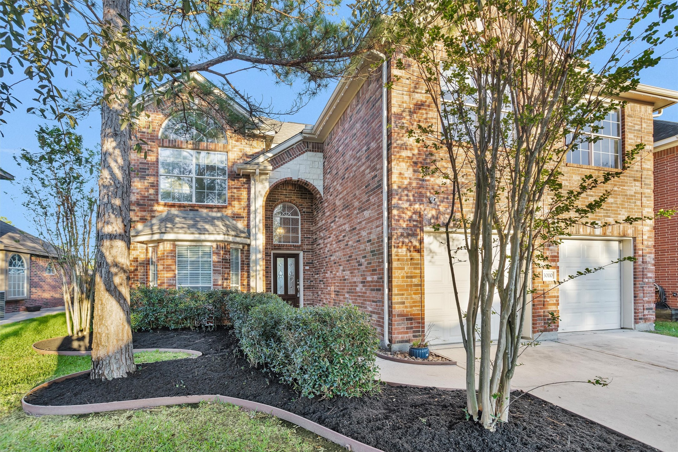 30110 Legends Ridge Drive Spring, TX 77386 - Photo 9 of 49 a front view of a house with a yard
