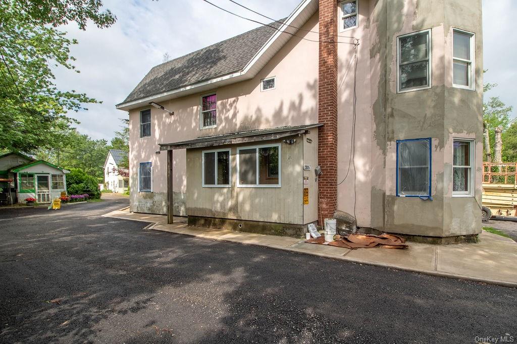 1105 Ulster Heights Road Ellenville, NY 12428 - Photo 2 of 36 View of side of home