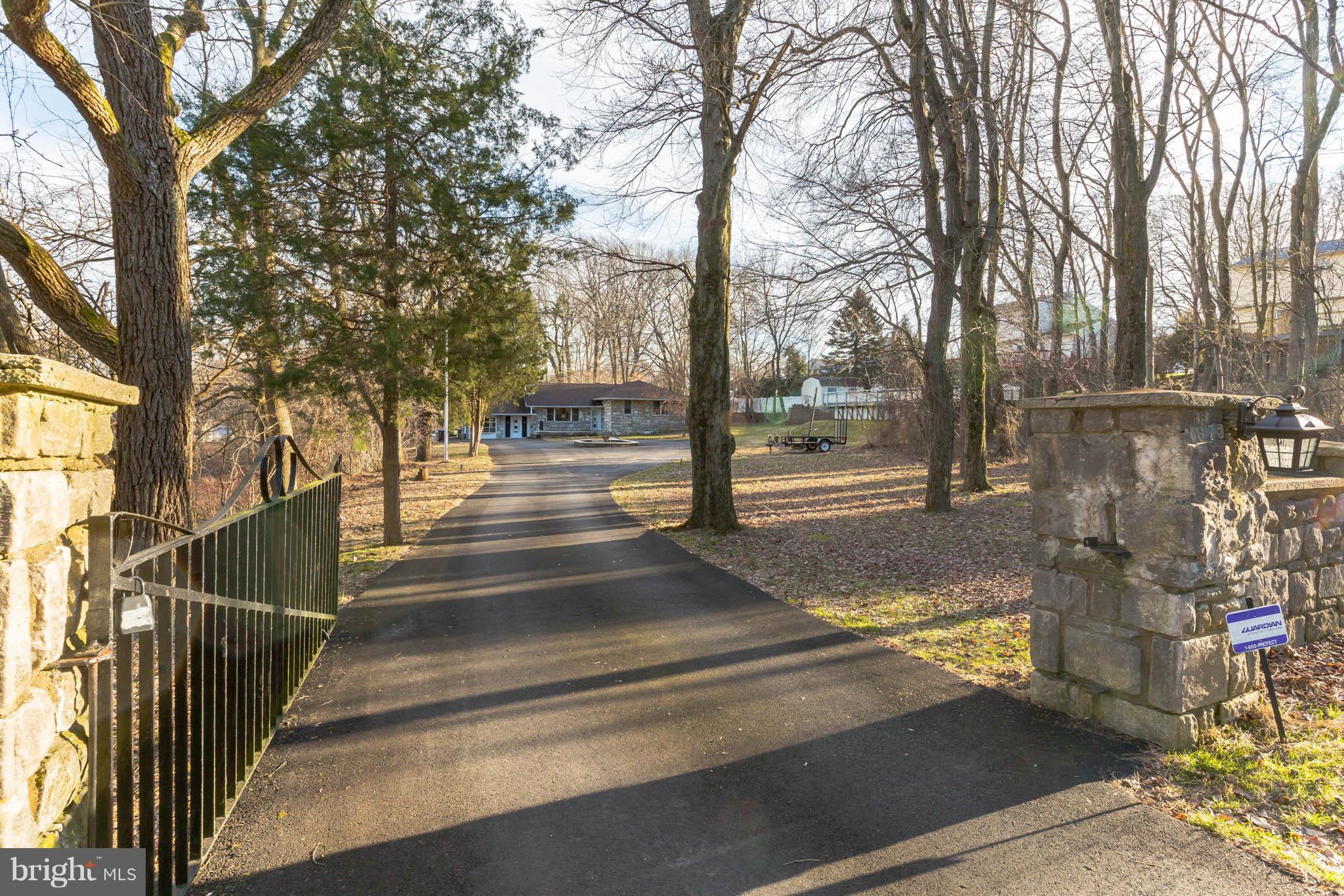 1675 Larkin Road Boothwyn, PA 19061 - Photo 2 of 31 Gated entrance