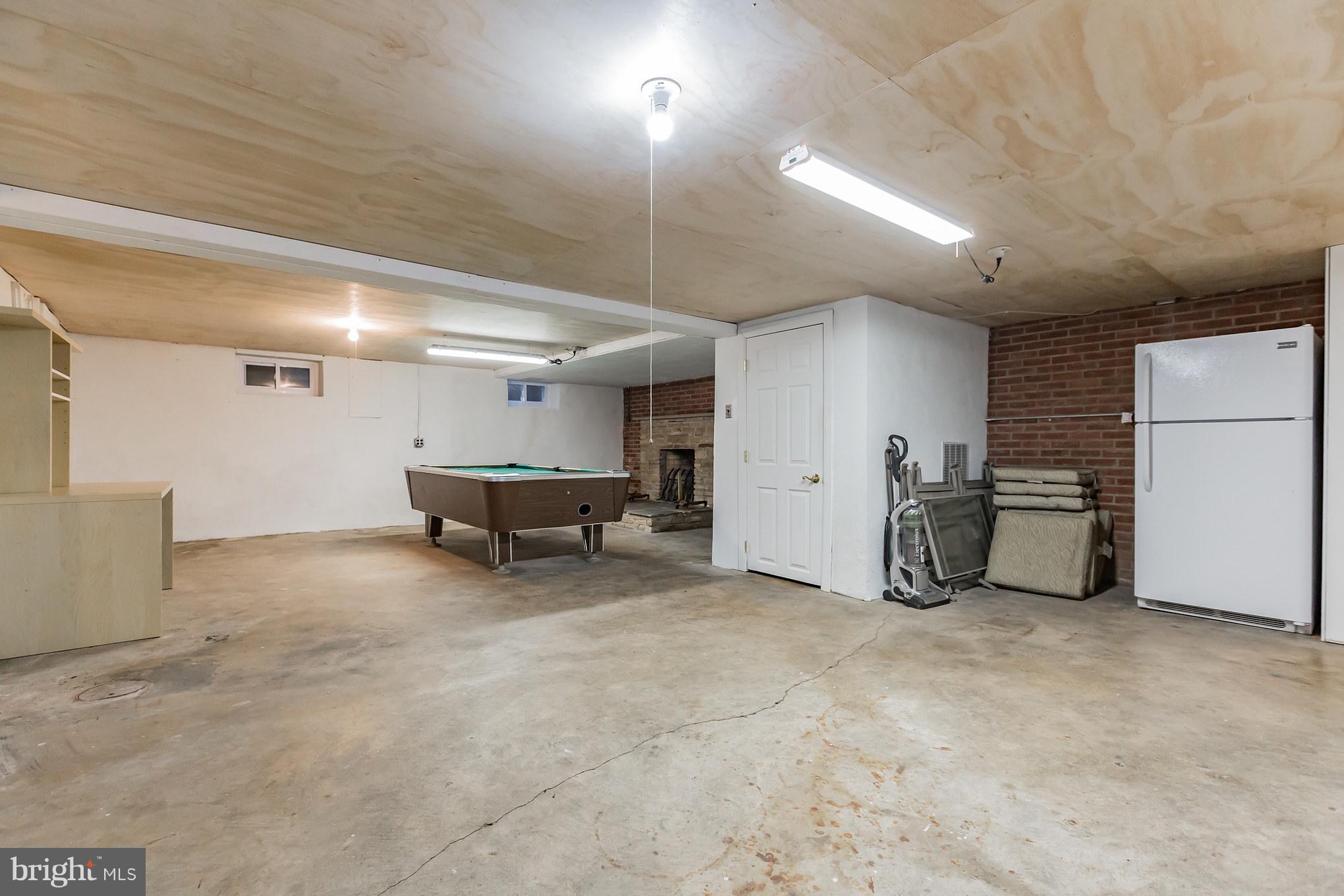 1675 Larkin Road Boothwyn, PA 19061 - Photo 23 of 31 Basement w/fire place