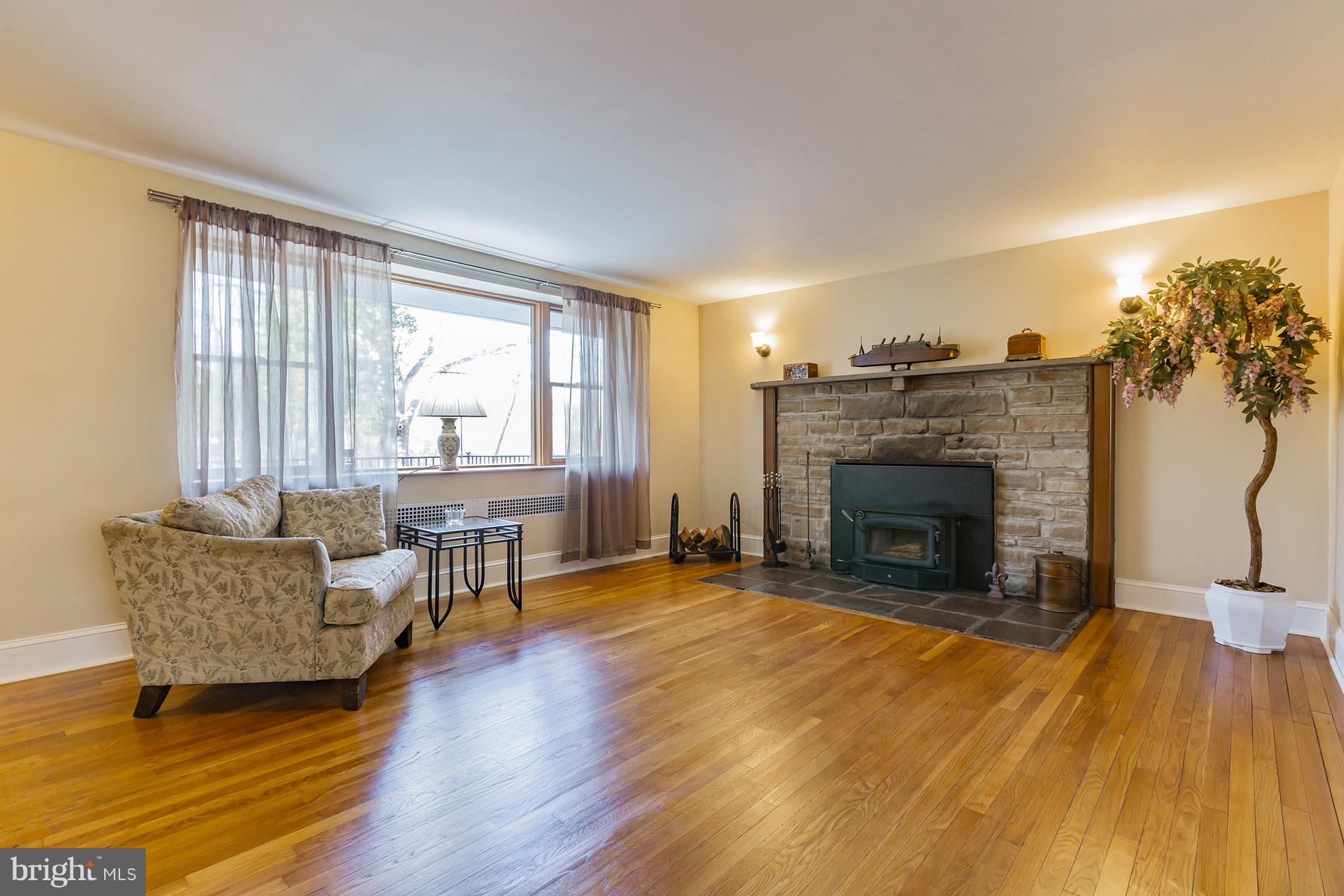 1675 Larkin Road Boothwyn, PA 19061 - Photo 5 of 31 Gorgeous Stone Fireplace with insert