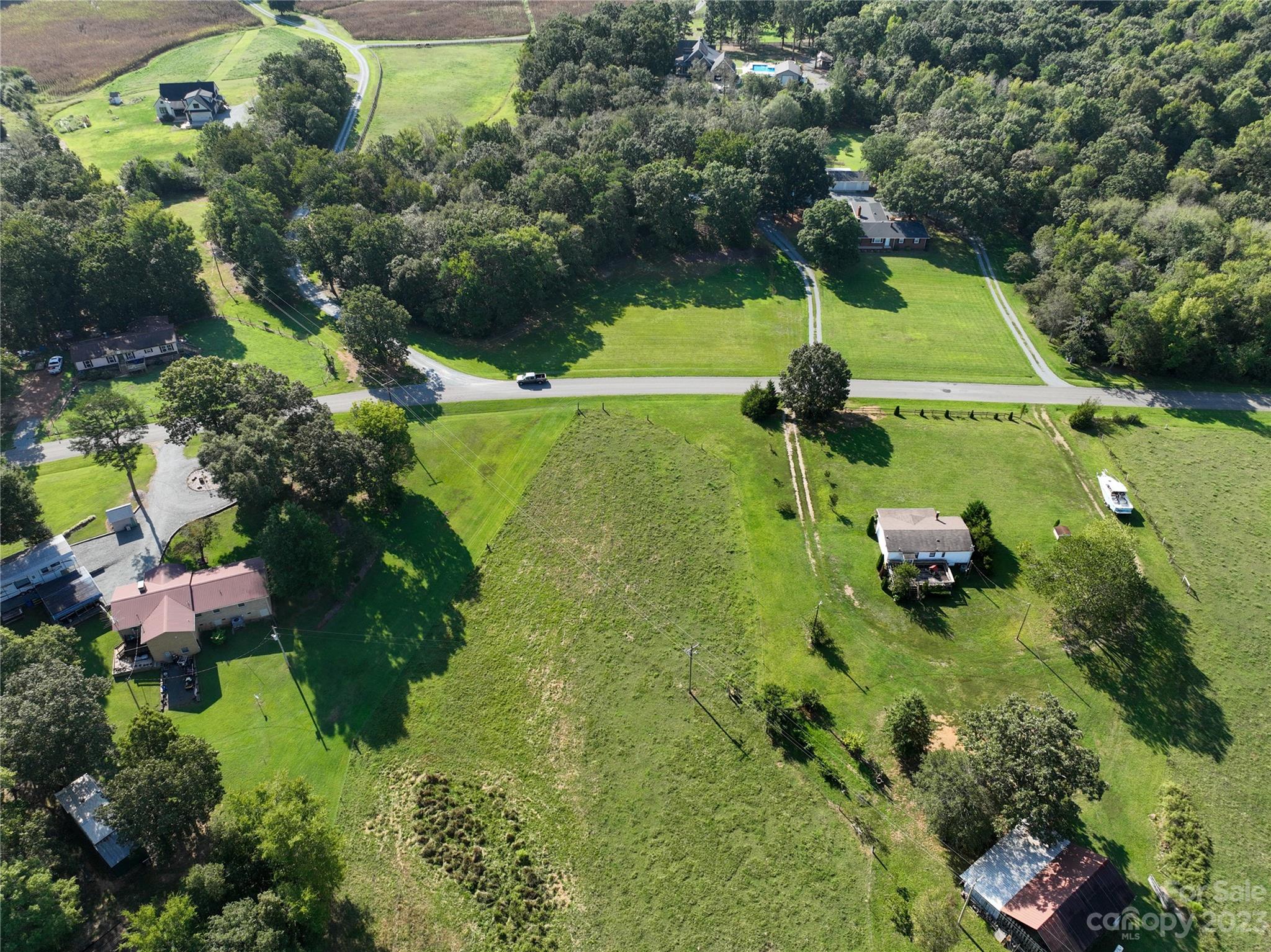 0 Santa Claus Road Monroe, NC 28110 - Photo 13 of 43 an aerial view of a golf course with parking space