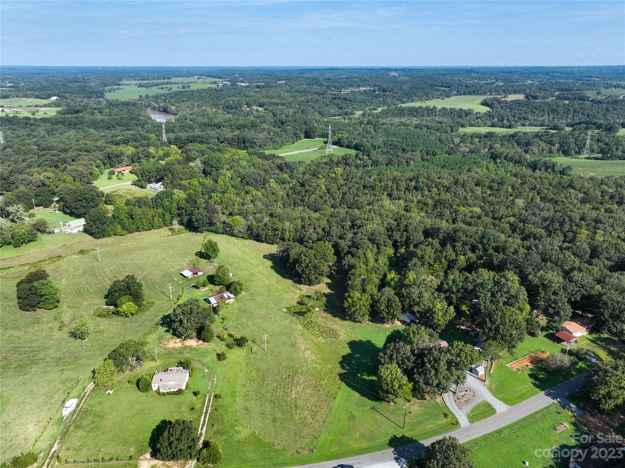 0 Santa Claus Road Monroe, NC 28110 - Photo 17 of 43 an aerial view of a residential houses with outdoor space and trees all around