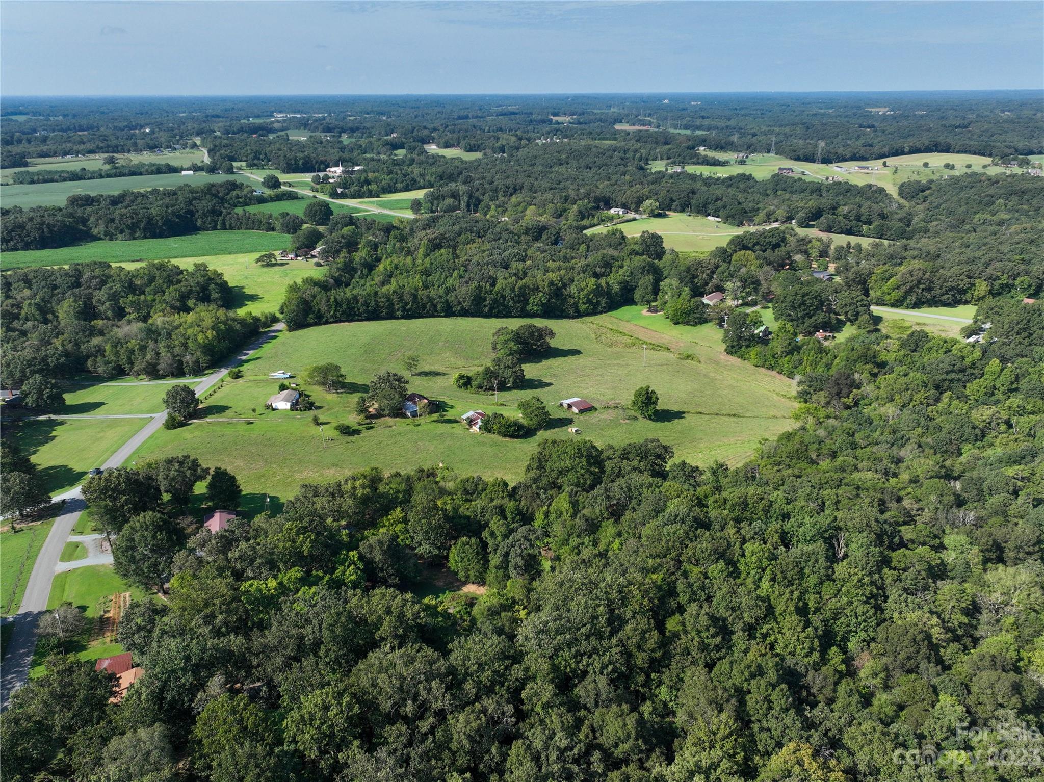 0 Santa Claus Road Monroe, NC 28110 - Photo 27 of 43 an aerial view of a residential houses with outdoor space and trees all around