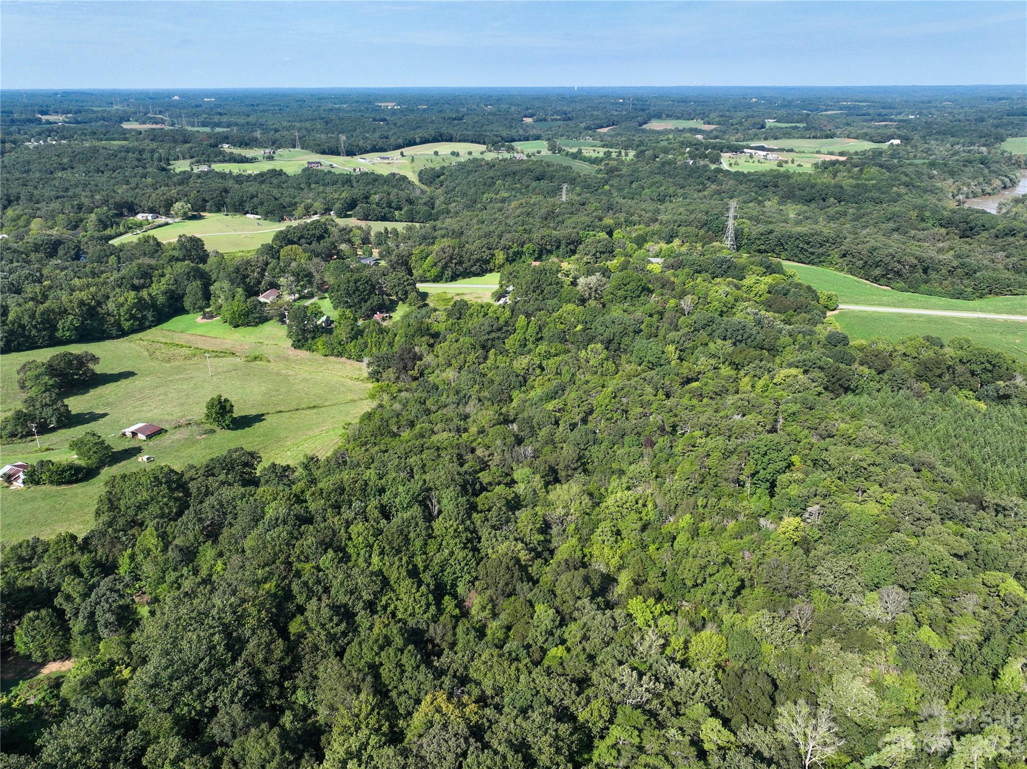 0 Santa Claus Road Monroe, NC 28110 - Photo 28 of 43 an aerial view of residential houses with outdoor space and trees