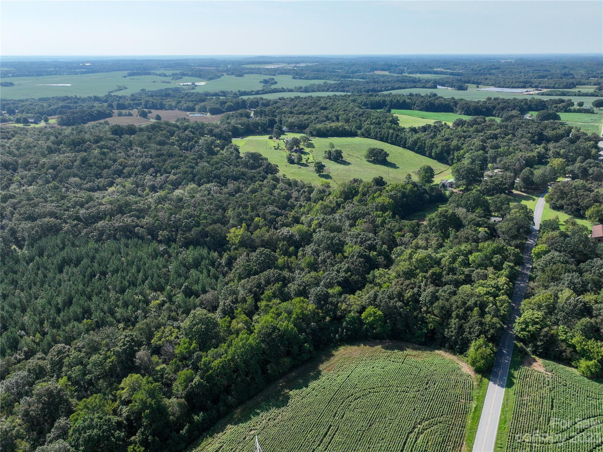 0 Santa Claus Road Monroe, NC 28110 - Photo 30 of 43 an aerial view of a house with a garden