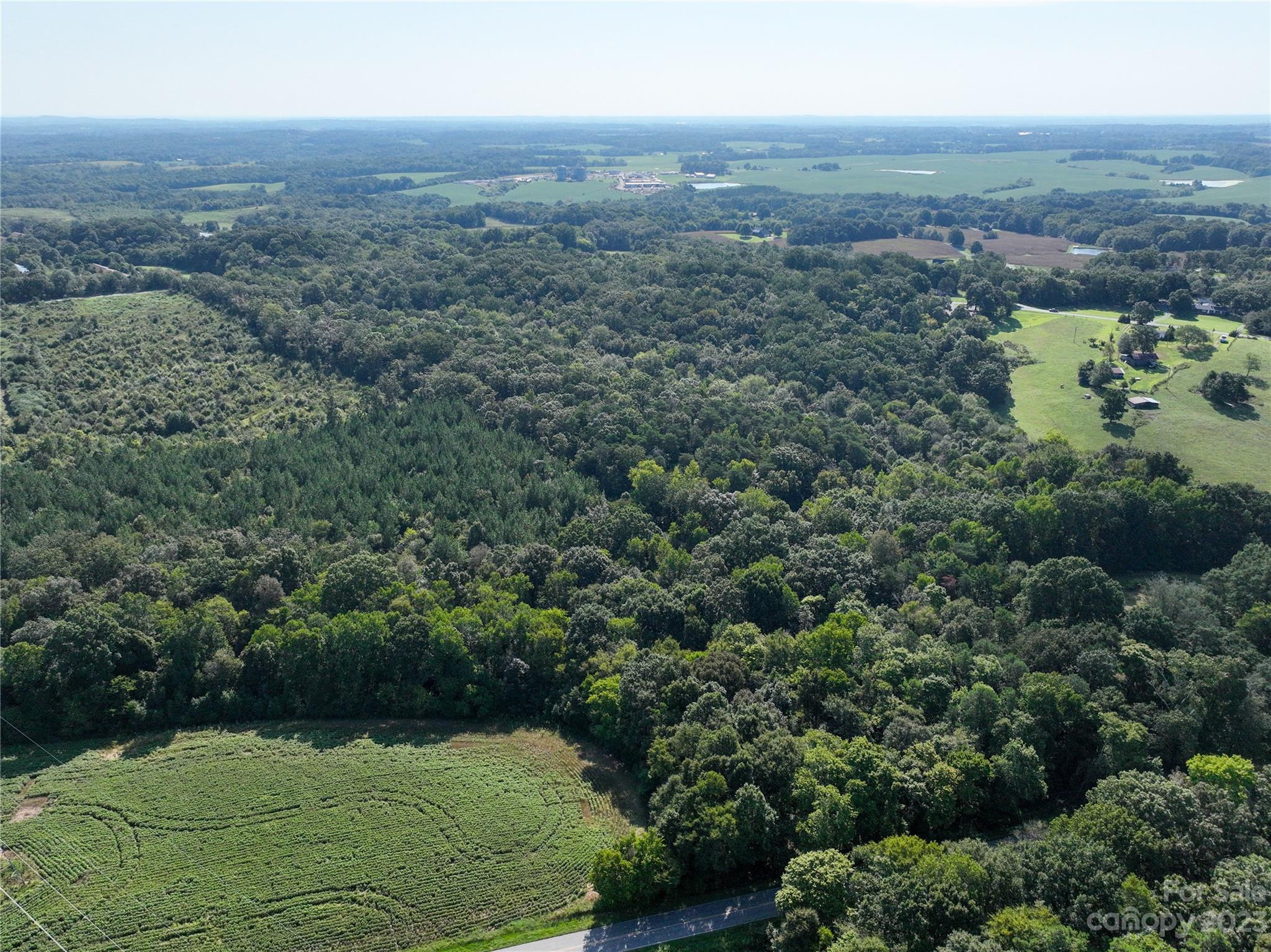 0 Santa Claus Road Monroe, NC 28110 - Photo 31 of 43 an aerial view of residential houses with outdoor space and trees