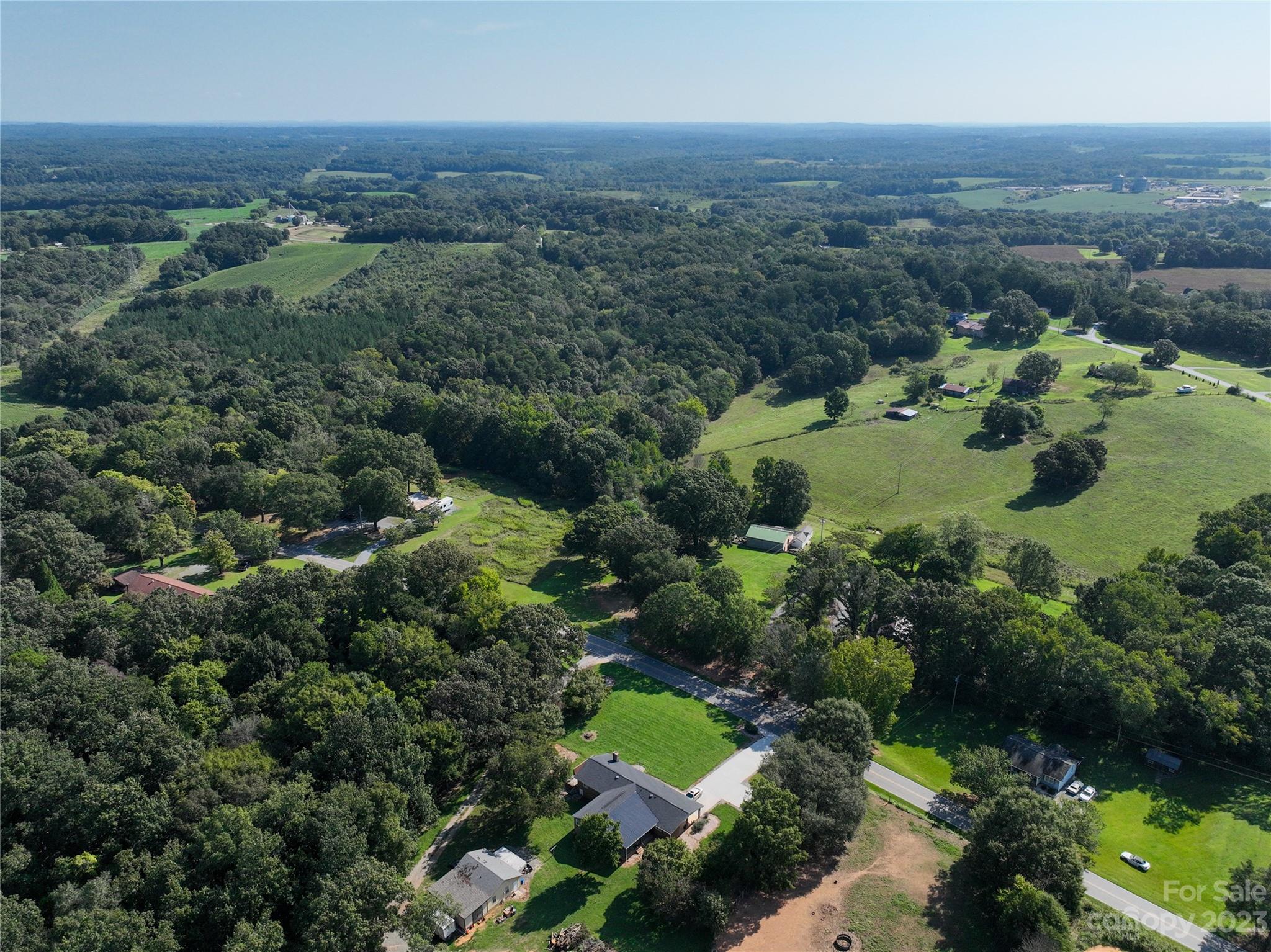 0 Santa Claus Road Monroe, NC 28110 - Photo 35 of 43 an aerial view of a houses with a yard