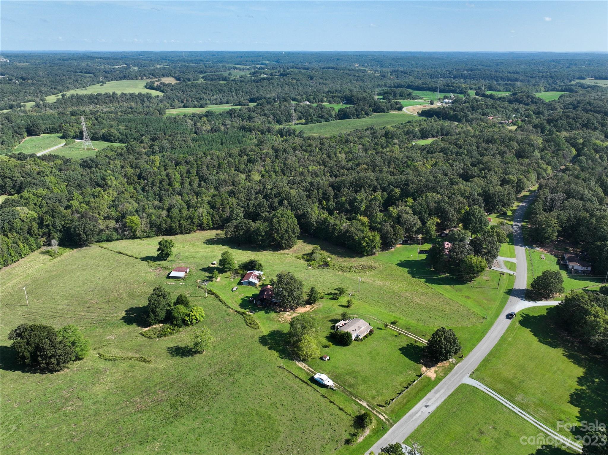 0 Santa Claus Road Monroe, NC 28110 - Photo 38 of 43 an aerial view of a forest with houses
