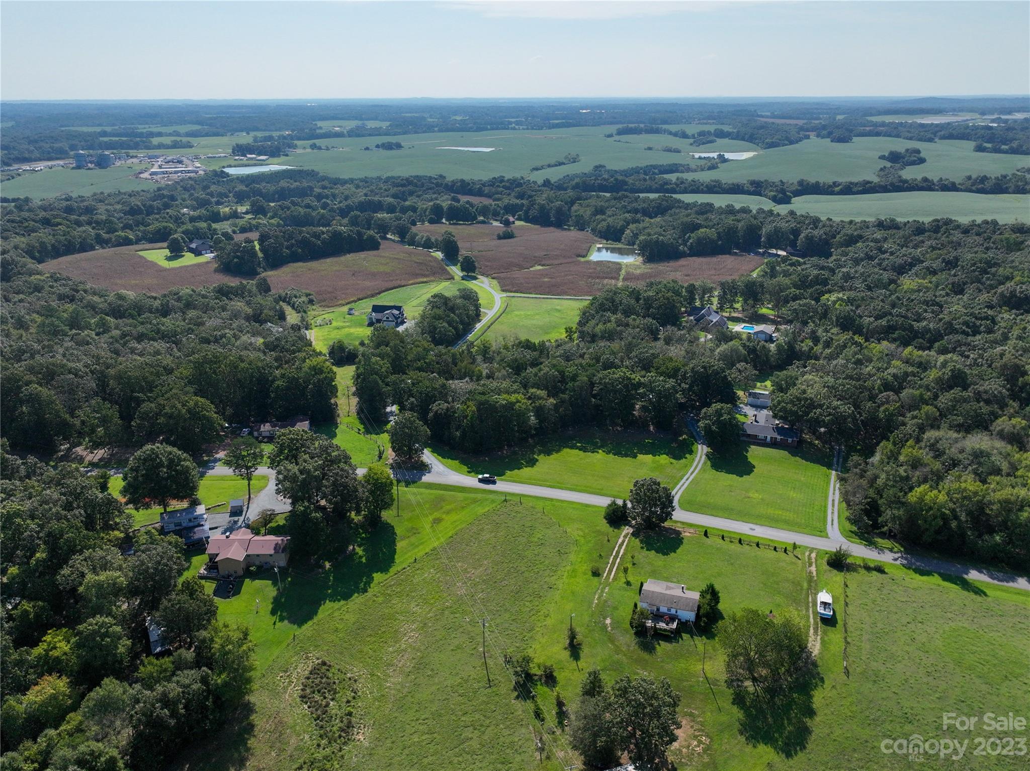 0 Santa Claus Road Monroe, NC 28110 - Photo 42 of 43 an aerial view of a houses with a yard