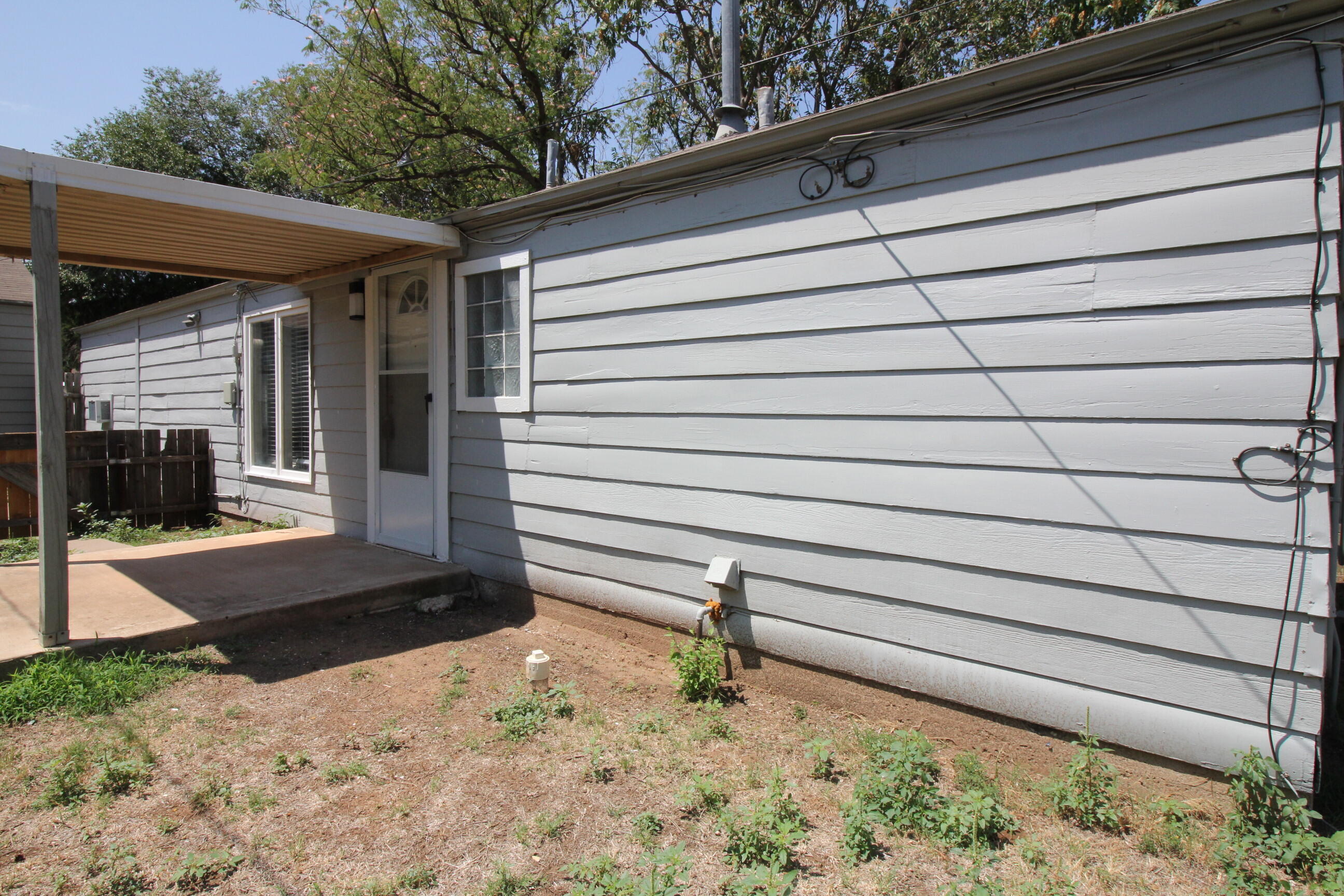 2216 30th Street Lubbock, TX 79411 - Photo 12 of 21 a view of a backyard
