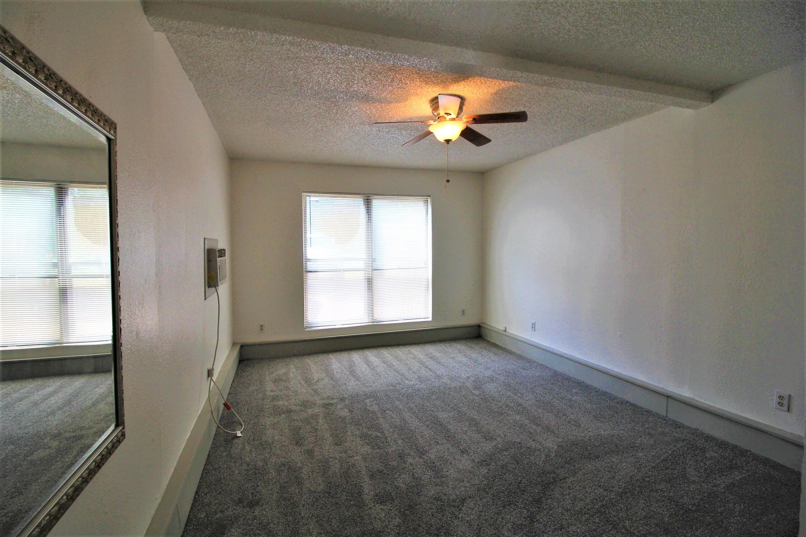 2216 30th Street Lubbock, TX 79411 - Photo 19 of 21 a view of an empty room with a window