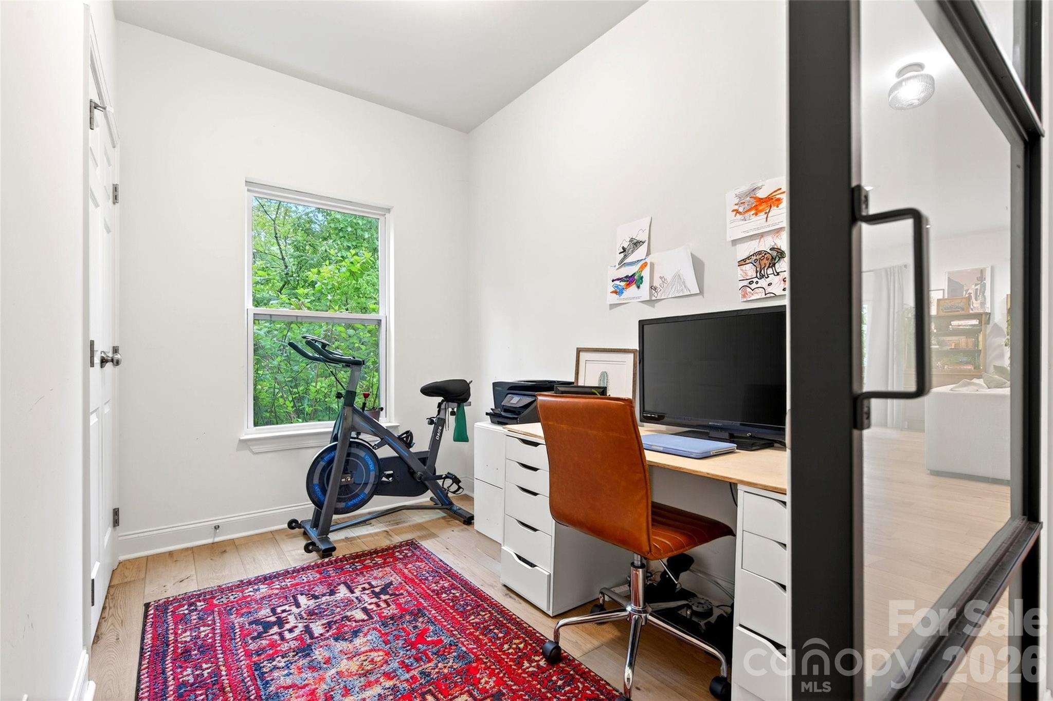 132 Maple Ridge Drive Old Fort, NC 28762 - Photo 23 of 40 a view of a workspace with furniture and a window
