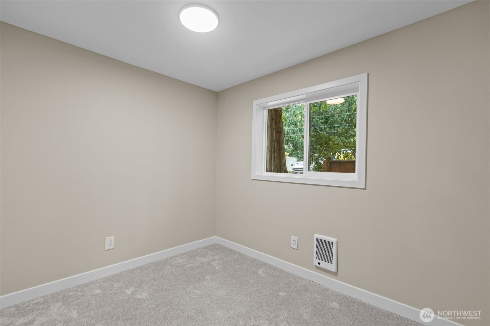 1729 194th Street Southeast, Unit 6 Bothell, WA 98012 - Photo 15 of 26 an empty room with a window
