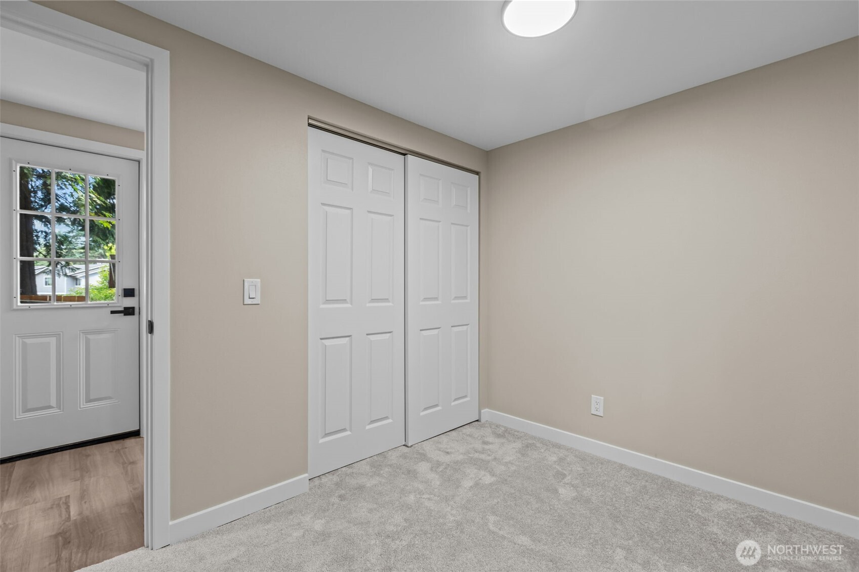 1729 194th Street Southeast, Unit 6 Bothell, WA 98012 - Photo 16 of 26 an empty room with windows