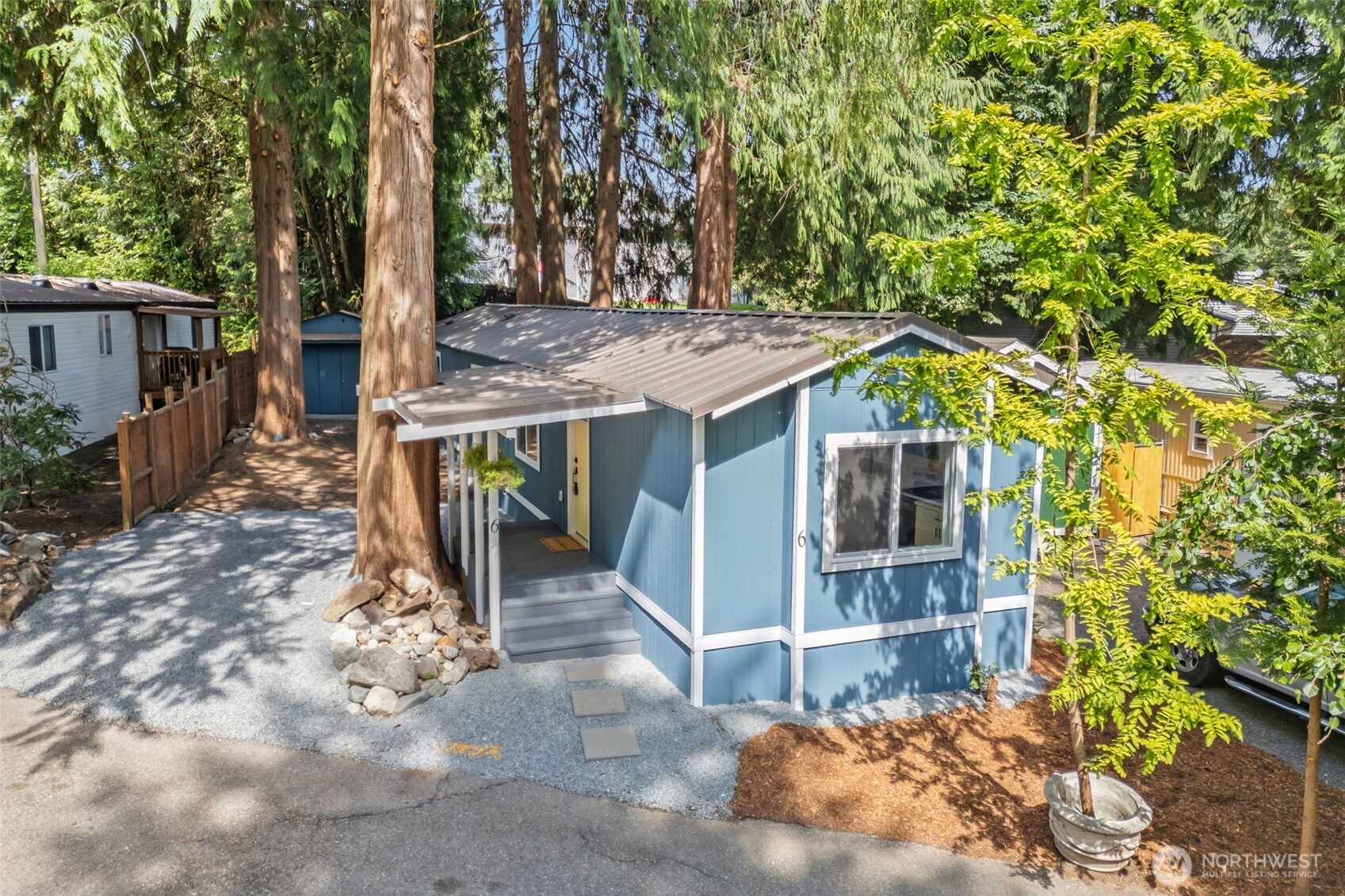 1729 194th Street Southeast, Unit 6 Bothell, WA 98012 - Photo 25 of 26 a view of a house with backyard and sitting area