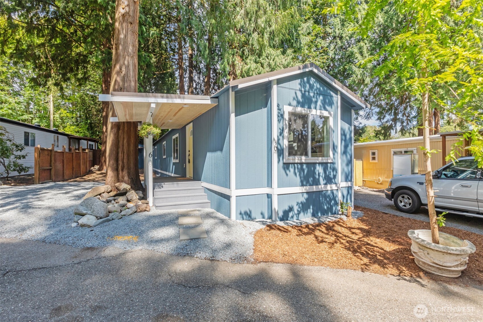 1729 194th Street Southeast, Unit 6 Bothell, WA 98012 - Photo 26 of 26 a view of a house with backyard and sitting area