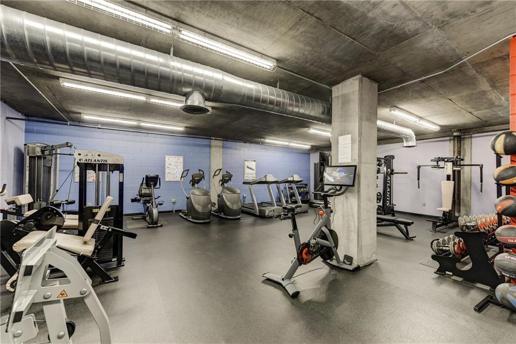 3180 Mathieson Drive Northeast, Unit 807 Atlanta, GA 30305 - Photo 21 of 22 a view of a room with gym equipment