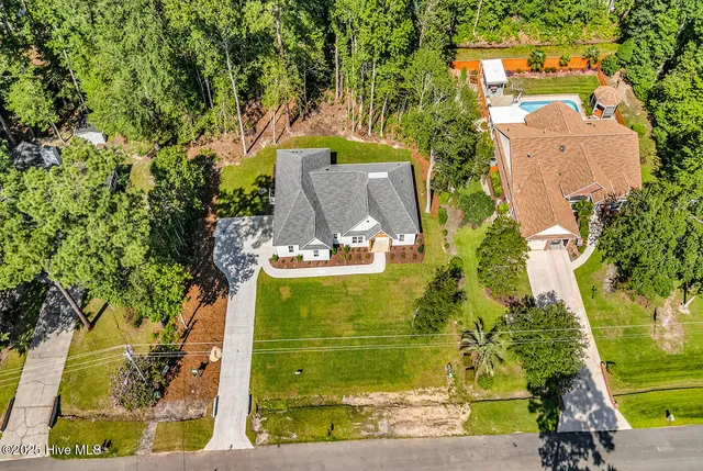 $499,900 | 25 Pinewood Drive, Carolina Shores, NC 28467