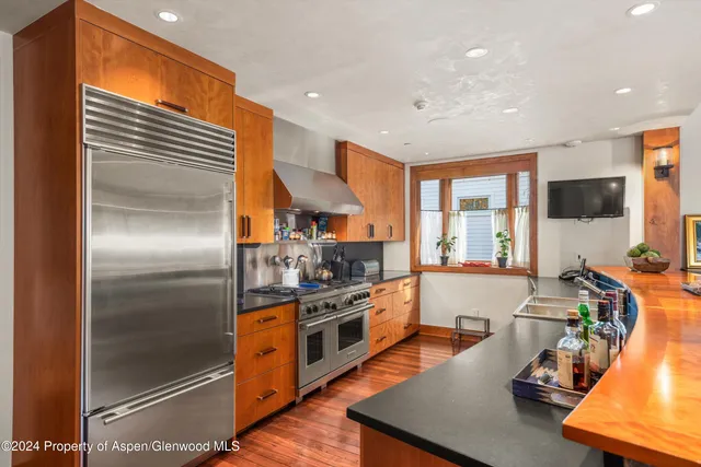 a bathroom with a sink double vanity and a mirror