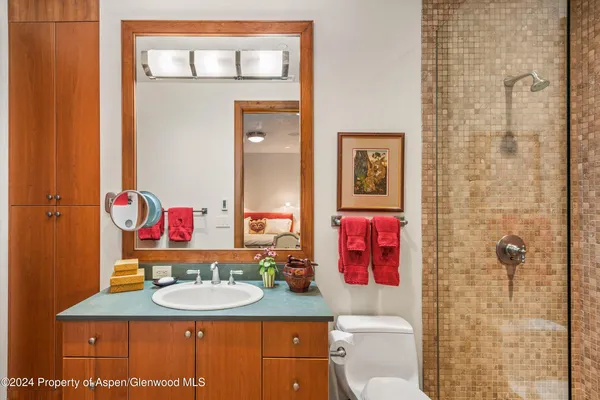 a view of a house with a yard and balcony