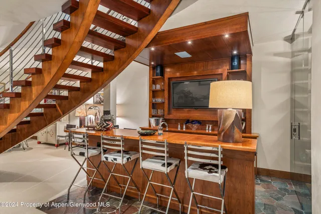a bedroom with furniture and window