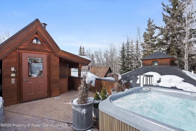 a view of staircase with wooden floor and a potted plant